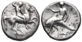Southern Apulia, Tarentum, c. 315-302 BC. AR Nomos (21mm, 7.56g). Warrior, holding shield and two spears, preparing to cast a third, on horseback r.; ...