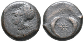 Sicily, Syracuse. Dionysios I (405-367 BC). Æ Drachm (27mm, 30.30g). Head of Athena l., wearing Corinthian helmet decorated with wreath. R/ Sea-star b...