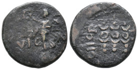 Macedon, Philippi, c. AD 41-68. Æ (20mm, 5.46g). Nike standing l. on base, holding wreath and palm. R/ Three standards. RPC I 1651. Near VF