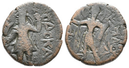 India, Kushan Empire. Kanishka I (c. AD 127/8-152). Æ Drachm (17mm, 4.14g). Kanishka standing l., holding goad and standard, sacrificing over altar. R...