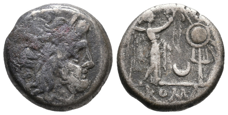 Anonymous, Rome, 207 BC. AR Victoriatus. Laureate head of Jupiter r. R/ Victory ...