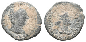 Caracalla (198-217). Mesopotamia, Carrhae. Æ (15mm, 2.39g). Laureate head of Caracalla r. R/ Turreted, veiled, and draped bust of Tyche r. Cf. SNG Cop...