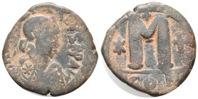 Justinian I (527-565). Æ 40 Nummi (29mm, 7.46g). Constantinople. Diademed, draped and cuirassed bust r. R/ Large M flanked by star and cross; B//CON. ...