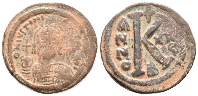 Justinian I (527-565). Æ 20 Nummi (25mm, 10.09g). Constantinople, year 26. Helme...