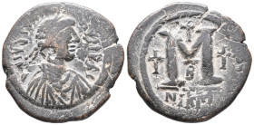 Justinian I (527-565). Æ 40 Nummi (27mm, 15.16g). Nicomedia. Diademed, draped and cuirassed bust r. R/ Large M; cross above, cross flanking; B//NIKM. ...