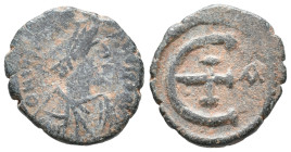 Justinian I (527-565). Æ 5 Nummi (14mm, 1.91g). Antioch, 542-546. Diademed and draped bust r. R/ Large Є with cross, A to r. Sear 241. Near VF