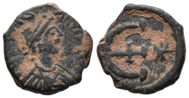Justinian I (527-565). Æ 5 Nummi (13mm, 2.36g). Theoupolis (Antioch), c. 551-560. Diademed, draped and cuirassed bust r. R/ Large Є with central cross...