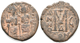 Justin II and Sophia (565-578). Æ 40 Nummi (28mm, 10.76g). Constantinople, year 6. Justin and Sophia, both nimbate, seated facing. R/ Large M; cross a...