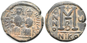 Justin II (565-578). Æ 40 Nummi (23mm, 12.33g). Nicomedia, year 5. Justin and Sophia, both nimbate, enthroned facing; Justin holding globus cruciger a...