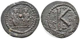 Justin II and Sophia (565-578). Æ 20 Nummi (23mm, 7.50g). Antioch. Justin, on l., and Sophia, on r., seated facing on a double throne, each holding sc...
