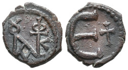 Justin II (565-578). Æ 5 Nummi (12mm, 1.50g). Theoupolis (Antioch). Monogram. R/ Large Є; cross to r. Sear 386. VF