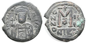 Tiberius II Constantine (578-582). Æ 40 Nummi (27mm, 11.21g). Nicomedia, year 4. Crowned facing bust, holding globus-cruciger and shield. R/ Large M; ...