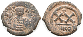 Tiberius II Constantine (578-582). Æ 20 Nummi (21mm, 3.98g). Nicomedia, 579-582. Helmeted and cuirassed bust facing, holding globus cruciger and shiel...
