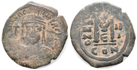 Maurice Tiberius (582-602). Æ 40 Nummi (28mm, 11.40g). Constantinople, year 3. Helmeted and cuirassed bust facing, holding globus cruciger. R/ Large M...