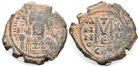 Maurice Tiberius (582-602). Æ 40 Nummi (31mm, 12.27g). Constantinople, year 12. Helmeted and cuirassed bust facing, holding globus cruciger. R/ Large ...