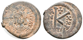 Maurice Tiberius (582-602). Æ 20 Nummi (24mm, 12.15g). Thessalonica, year 20. Helmeted and cuirassed facing bust, holding globus cruciger. R/ Large K;...