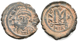Maurice Tiberius (582-602). Æ 40 Nummi (30mm, 11.21g). Nicomedia, year 10. Helmeted and cuirassed bust facing, holding globus cruciger and shield. R/ ...