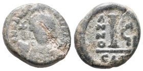 Maurice Tiberius (582-602). Æ 10 Nummi (13mm, 3.10g). Catania, year 7. Crowned and cuirassed facing bust, holding globus cruciger and shield. R/ Large...