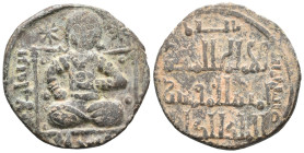 Islamic, Artuqids, Æ (25mm, 8.40g). Figure seated facing between two stars. R/ Legend. Near VF