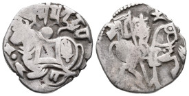 Afghanistan, Indian Empire, 10th-12th century AD. AR Drachm (17mm, 3.10g). Horseman r. R/ Bull l., head r. VF
