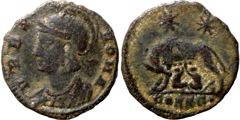 Constantinus I. (306-337 AD). Æ Follis. Antioch. Obv: VRBS ROMA. helmeted bust o...