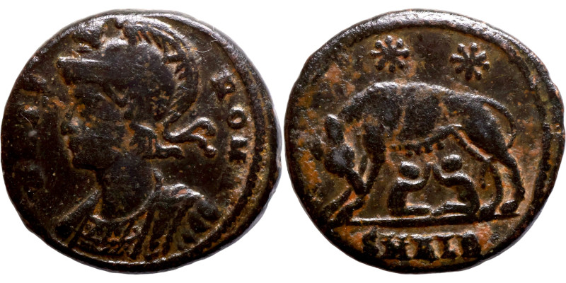 Constantinus I. (306-337 AD). Æ Follis. Antioch. Obv: VRBS ROMA. helmeted bust o...