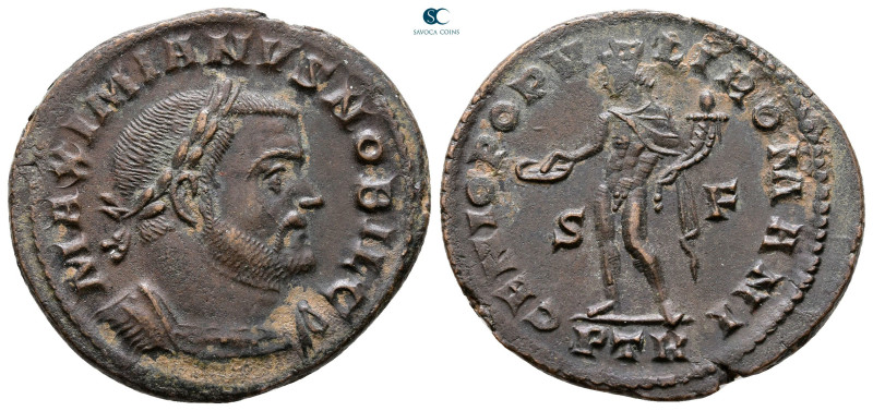 Galerius Maximianus, as Caesar AD 293-305. Treveri
Follis Æ

29 mm, 9,09 g
...