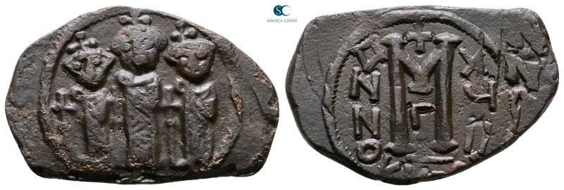 Heraclius, with Martina and Heraclius Constantine AD 610-641. Cyprus
Follis or ...