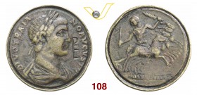 CONTORNIATI (IV-V Sec. d.C.) D/ Busto laureato e drappeggiato di Traiano; nel campo monogramma PE graffito R/ Quadriga veloce; l'auriga regge una frus...
