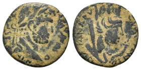 MESOPOTAMIA. Carrhae. Caracalla (198-217). Ae. 

Obv : M AVR ANTONINV F VA.
Laureate head right. 

Rev : COI MET ANTONINIAN Δ AVG.
Veiled head of Tych...