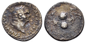 DIVUS VESPASIAN.(Died 79). Rome.Denarius.

Obv : DIVVS AVGVSTVS VESPASIANVS.
Laureate head right.

Rev : S C.
Foreparts of two capricorns springing ou...