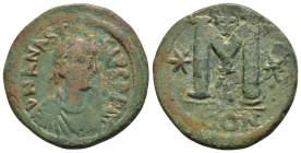 ANASTASIUS I.(491-518).Constantinople.Follis.

Obv : DN ANASTASIVS PP AVG.
Pearl diademed, draped, cuirassed bust to right.

Rev : Large M, star left,...