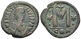 ANASTASIUS I.(491-518).Constantinople.Follis.

Obv : DN ANASTASIVS PP AVG.
Pearl diademed, draped, cuirassed bust to right.

Rev : Large M, star left,...