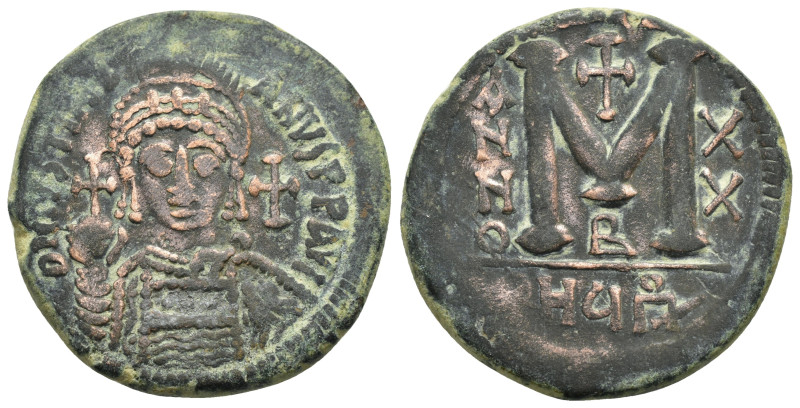 JUSTINIAN I (527-565).Antioch.Follis.

Obv : D N IVSTINIANVS P P A.
Helmeted and...