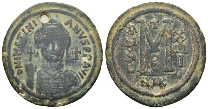 JUSTINIAN I.(527-565).Nicomedia.Follis.

Obv : DN IVSTINIANVS PP AVG.
Helmeted, ...