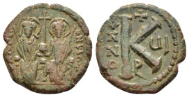 JUSTIN II and SOPHIA.(565-578).Antioch.Half Follis.

Obv : Justin left and Sophia right, seated facing on double-throne, both nimbate, each holding a ...