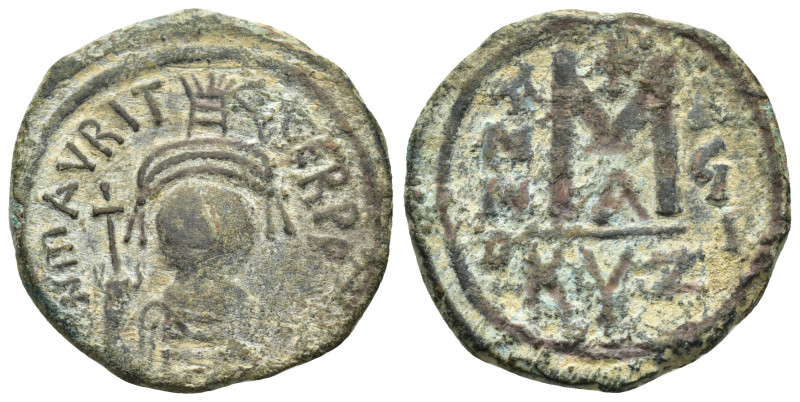 MAURICE TIBERIUS (582-602). Follis. Cyzicus.

Obv : D N ΜΑVRI TIЬЄR P P AV.
Helm...