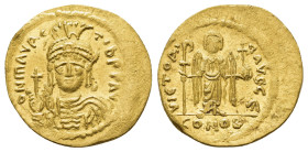 MAURICE TIBERIUS (582-602).Constantinople.Solidus.

Obv : D N mAVRC TIb P P AVG.
Helmeted, draped and cuirassed bust facing, holding globus crucige...