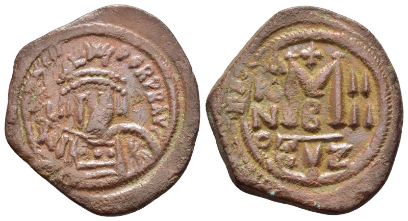 MAURICE TIBERIUS (582-602).Cyzicos.Follis.

Obv : D N mAVRIC TIbER P P A.
Helmet...