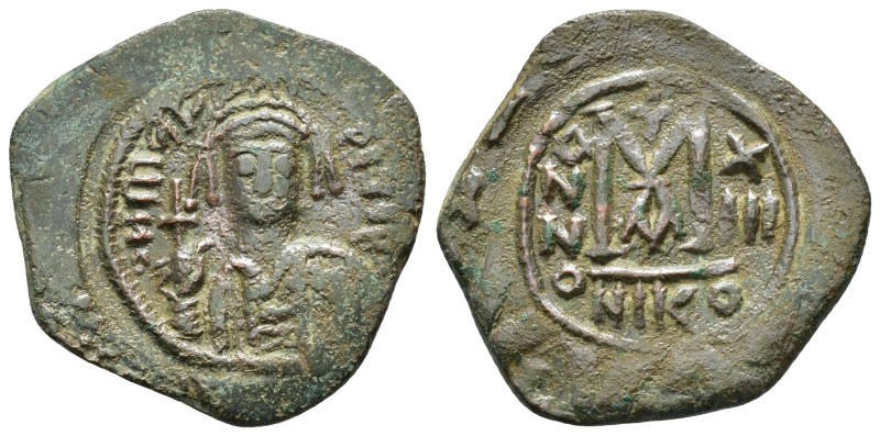 MAURICE TIBERIUS.(582-602). Nicomedia.Follis.

Obv : D N MAVR BIRЄ P P.
Helmeted...
