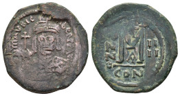 MAURICE TIBERIUS.(582-602).Constantinople.Follis.

Obv : D N MAVRIC TIЬЄR P P AV.
Crowned facing bust, wearing consular robes and holding mappa and ea...
