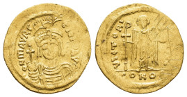 MAURICE TIBERIUS (582-602).Constantinople.Solidus.

Obv : D N mAVRC TIb P P AVG.
Helmeted, draped and cuirassed bust facing, holding globus crucige...