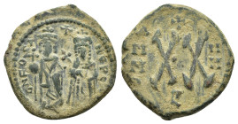 PHOCAS (602-610).Antioch.Half Follis.

Obv : D FOCA NЄ PЄ AV.
Phocas and Leontia standing facing; cross above.

Rev : Large XX; cross above, e below; ...