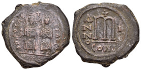 PHOCAS.(602-610).Constantinople.Follis.

Obv : δ M FOCAЄ P P AЧ.
Phocas, holding globus cruciger, and Leontia, holding cruciform scepter, standing fac...