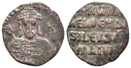CONSTANTINE VII with ROMANUS I.(913-959).Constantinople.Follis.

Obv : + RωMAҺ ЬASILЄVS RωM.
Crowned facing bust of Romanus, holding globus cruciger a...