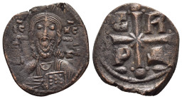 ROMANUS IV.(1068-1071).Constantinople.Follis.

Obv : IC XC NI KA.
Facing bust of Christ, nimbate, holding book of Gospels.

Rev : C R P Δ.
Cross with ...