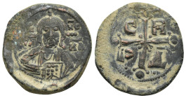 ROMANUS IV.(1068-1071).Constantinople.Follis.

Obv : IC XC NI KA.
Facing bust of Christ, nimbate, holding book of Gospels.

Rev : C R P Δ.
Cross with ...