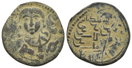 ISLAMIC.Anatolia & al-Jazira (Post-Seljuk). Artuqids (Kayfa & Amid). Fakhr al-Din Qara Arslan.(1148-1174).AE Dirham. 

Obv : Bare-headed and draped ha...