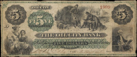 Oil City, Pennsylvania. Oil City Bank. 1864 $5. Very Good.
No. 1999. Plate D. Featuring a central vignette focused upon a pair of Civil-War-era soldi...