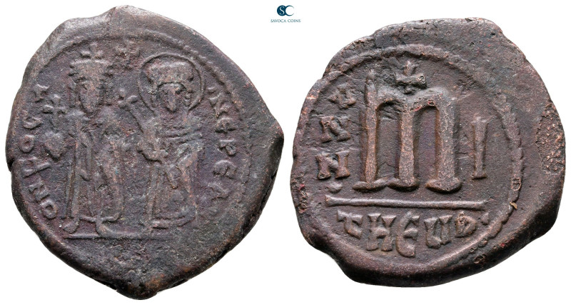 Phocas, with Leontia AD 602-610. Theoupolis (Antioch)
Follis or 40 Nummi Æ

3...